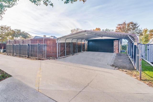 garage featuring a carport