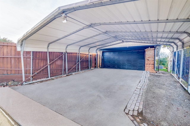 garage featuring a carport