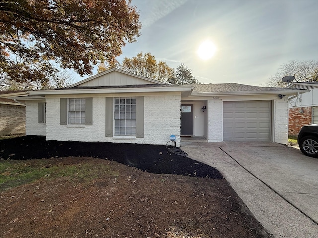 single story home with a garage