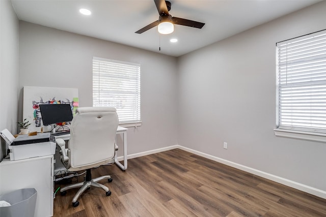 office with hardwood / wood-style floors and ceiling fan