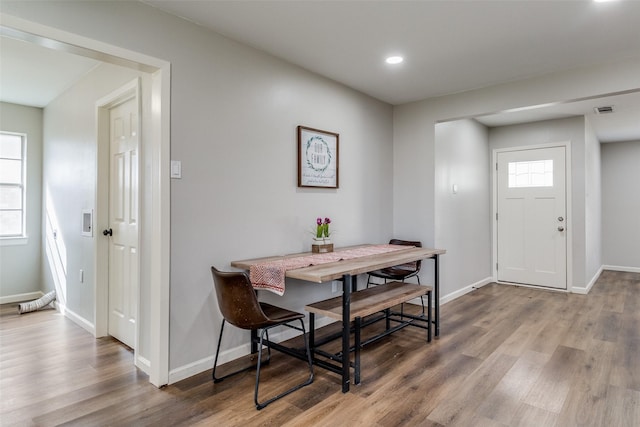 dining area featuring wood-type flooring