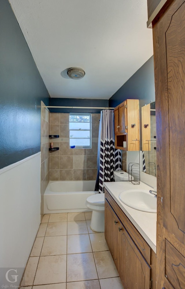 full bathroom with tile patterned flooring, vanity, toilet, and shower / bath combo