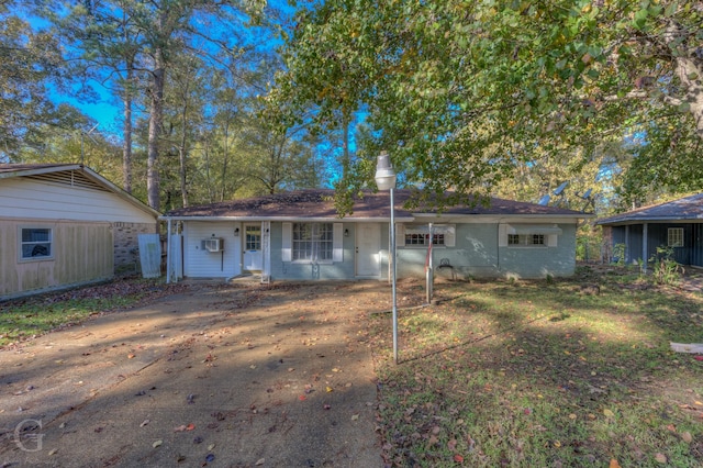 exterior space with cooling unit and a porch