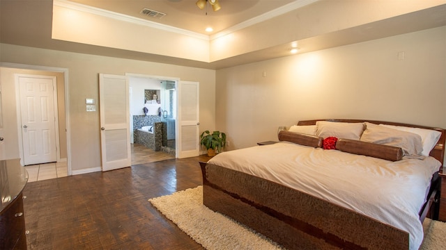 bedroom featuring crown molding and dark hardwood / wood-style floors