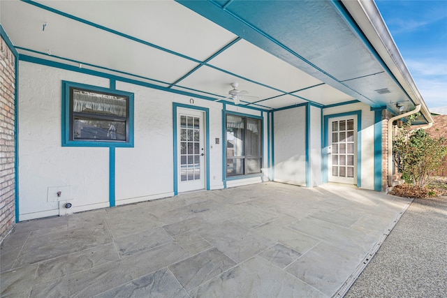 view of patio featuring a ceiling fan