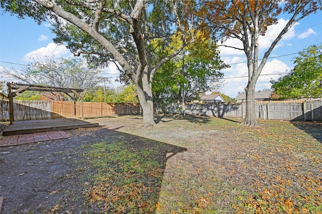 view of yard featuring a deck