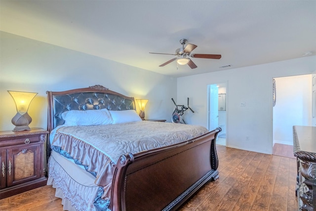 bedroom with hardwood / wood-style floors and ceiling fan