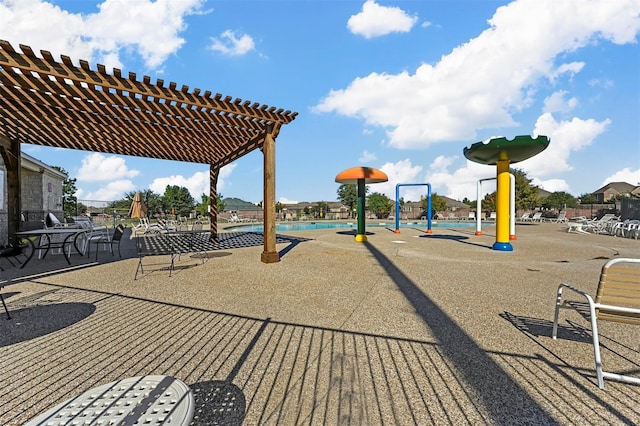 view of jungle gym with a pergola