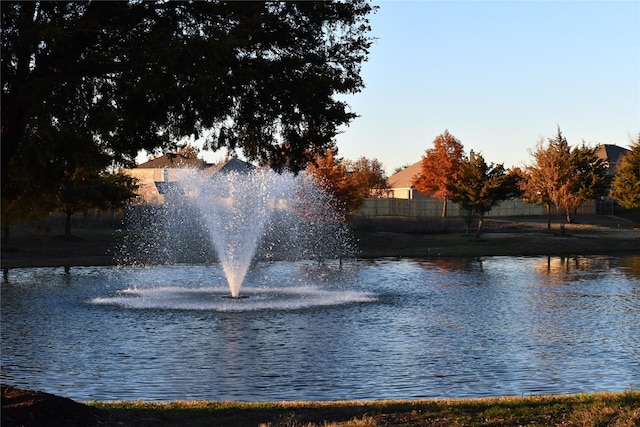 view of community with a water view