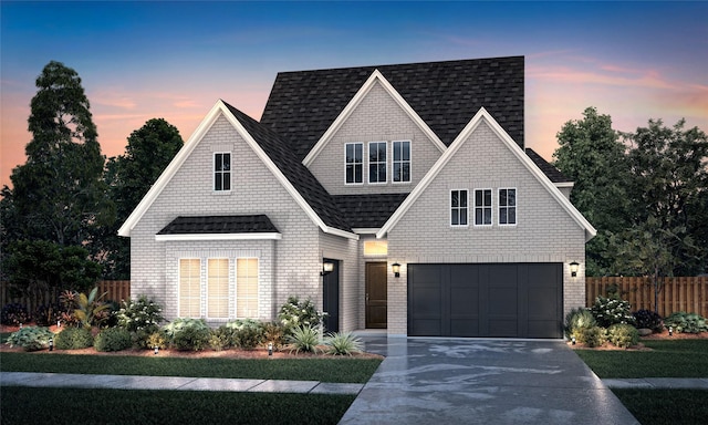 view of front of home with a garage