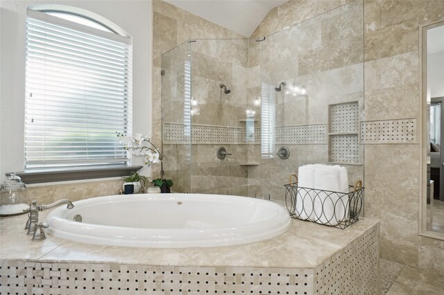 bathroom featuring separate shower and tub and vanity