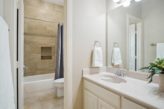 full bathroom with toilet, vanity, tile patterned floors, and shower / bath combo with shower curtain