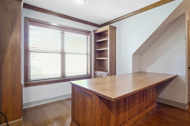 home office with a healthy amount of sunlight, dark hardwood / wood-style floors, and ornamental molding