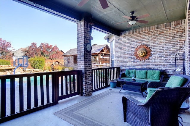 view of patio featuring outdoor lounge area and ceiling fan