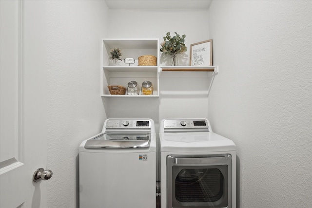 laundry area featuring washing machine and dryer