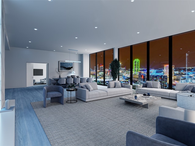 living room featuring hardwood / wood-style flooring and floor to ceiling windows