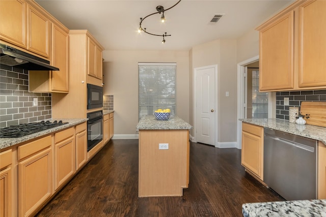 kitchen with light stone counters, dark hardwood / wood-style flooring, a kitchen island, and black appliances