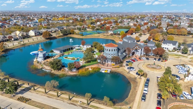 1125 Appalachian Ln, Savannah, TX 76227 - aerial view of property and surrounding area featuring a large body of water, a pool area, and nearby suburban area