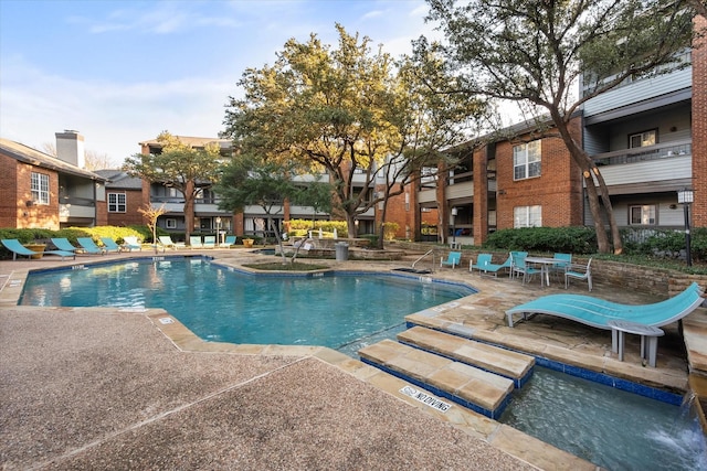 view of pool with a patio area