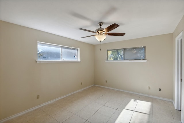 unfurnished bedroom featuring ceiling fan and light tile patterned flooring