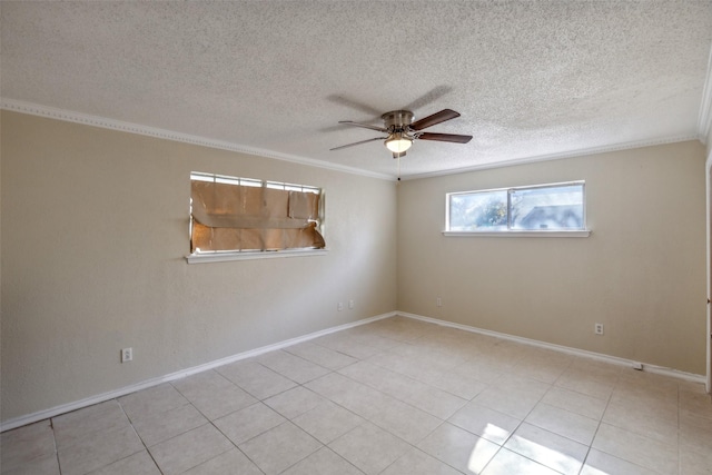 tiled empty room featuring a textured ceiling, ceiling fan, and ornamental molding