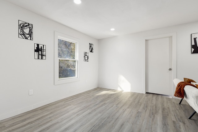 empty room with light wood-type flooring