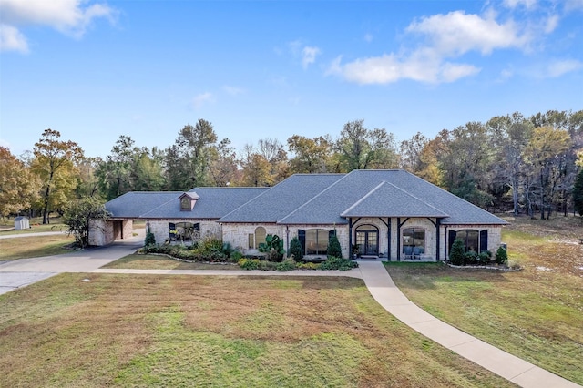 view of front of home with a front yard