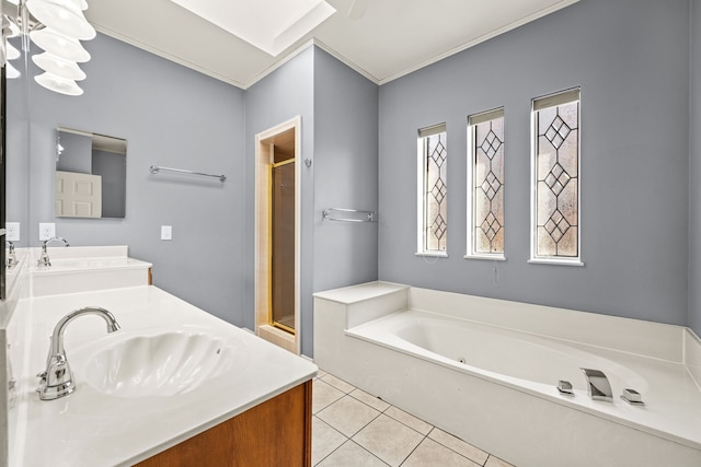 bathroom with plus walk in shower, vanity, tile patterned floors, and ornamental molding