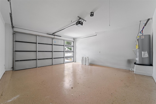 garage with a garage door opener and electric water heater