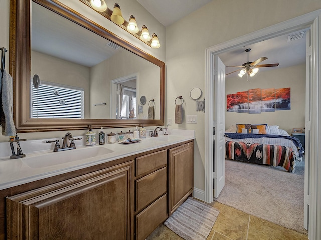 bathroom featuring vanity and ceiling fan