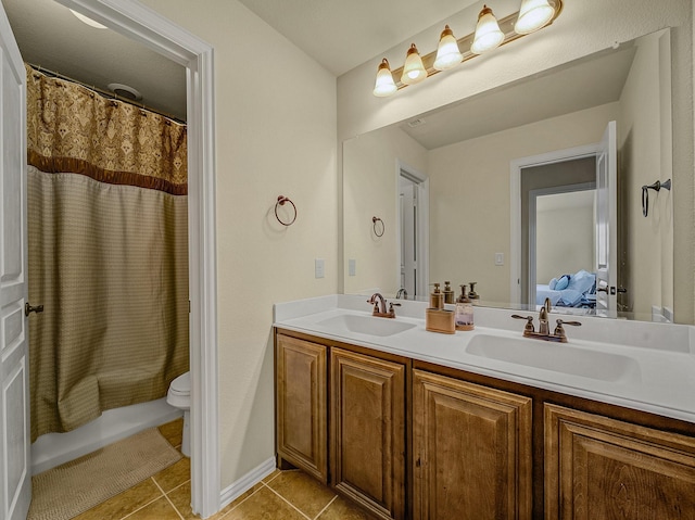 full bathroom featuring vanity, tile patterned floors, toilet, and shower / tub combo with curtain