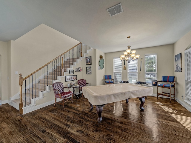 recreation room featuring an inviting chandelier, dark wood-type flooring, and pool table