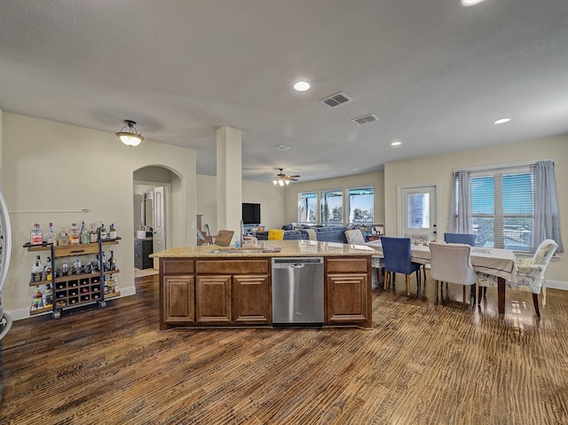 2000 Historic District, Aubrey, TX 76227 - kitchen with dishwasher, open floor plan, arched walkways, dark wood-style floors, and ceiling fan