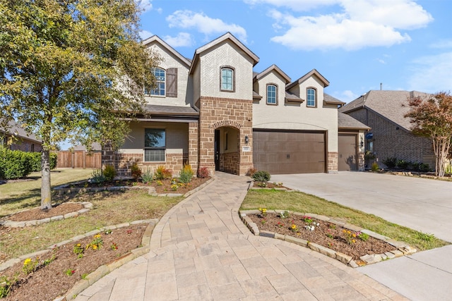 view of front of property with a garage