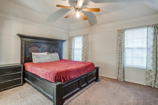 bedroom with light colored carpet, ceiling fan, and crown molding