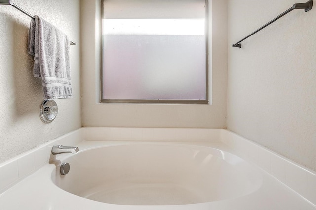 bathroom featuring a bathtub