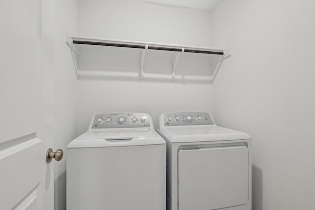 laundry area featuring washer and clothes dryer