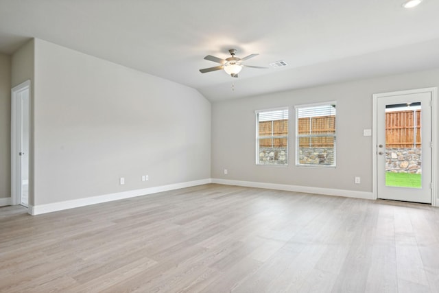 unfurnished room featuring vaulted ceiling, light hardwood / wood-style flooring, and ceiling fan