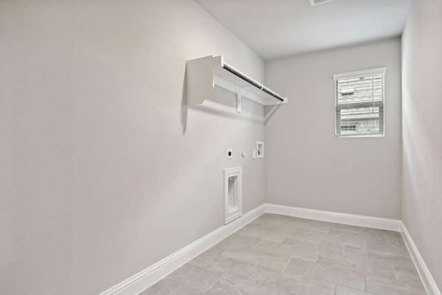 clothes washing area featuring hookup for an electric dryer, hookup for a gas dryer, and washer hookup