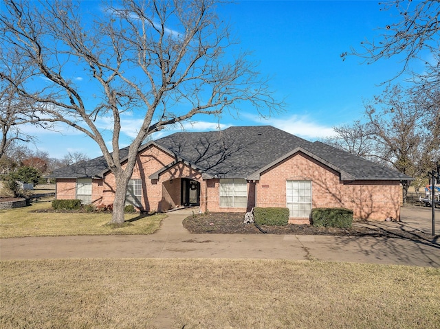 ranch-style home with a front yard