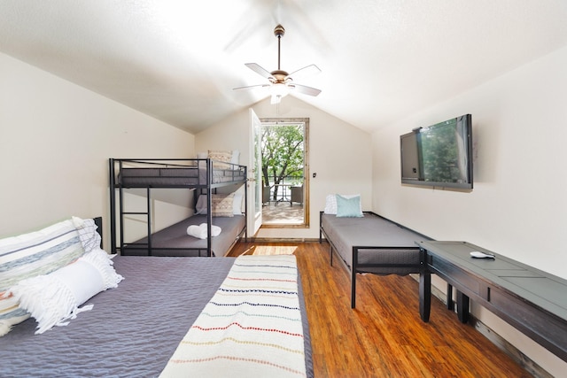 bedroom with access to exterior, ceiling fan, dark wood-type flooring, and lofted ceiling