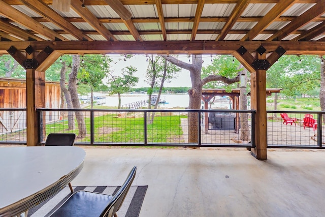 view of patio / terrace featuring a water view