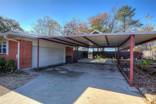 view of car parking with a garage and a carport