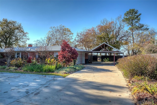 view of front facade with a carport