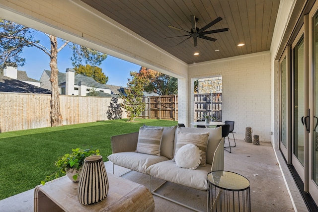 view of patio / terrace with ceiling fan and an outdoor hangout area