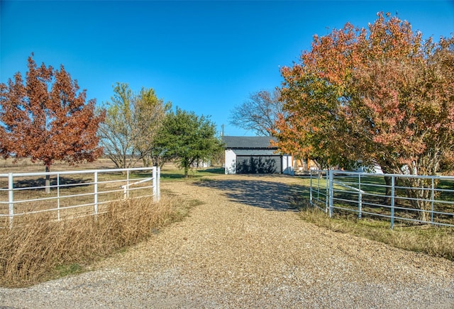 exterior space with a rural view