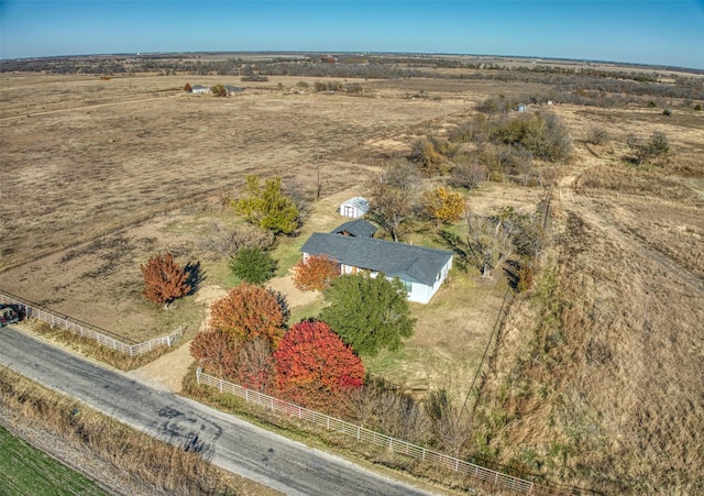 birds eye view of property featuring a rural view