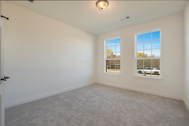 view of carpeted spare room