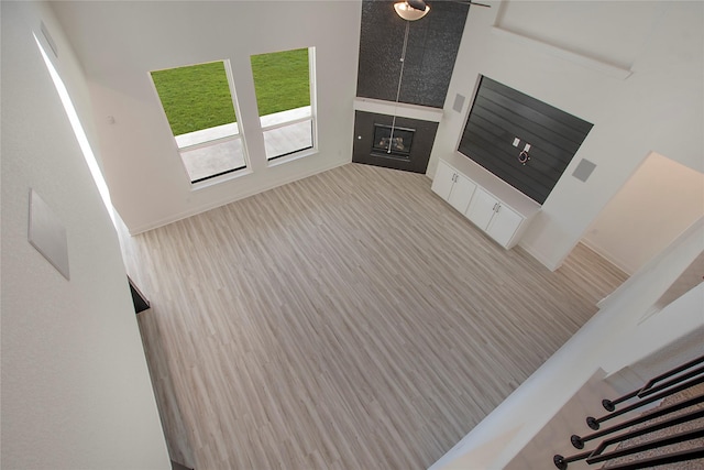 unfurnished living room featuring light hardwood / wood-style flooring