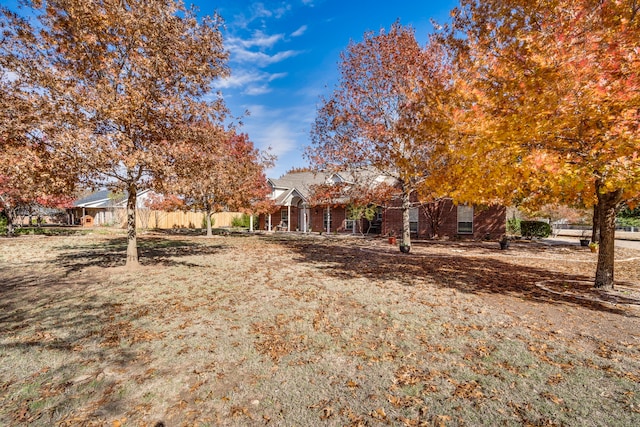 view of property hidden behind natural elements